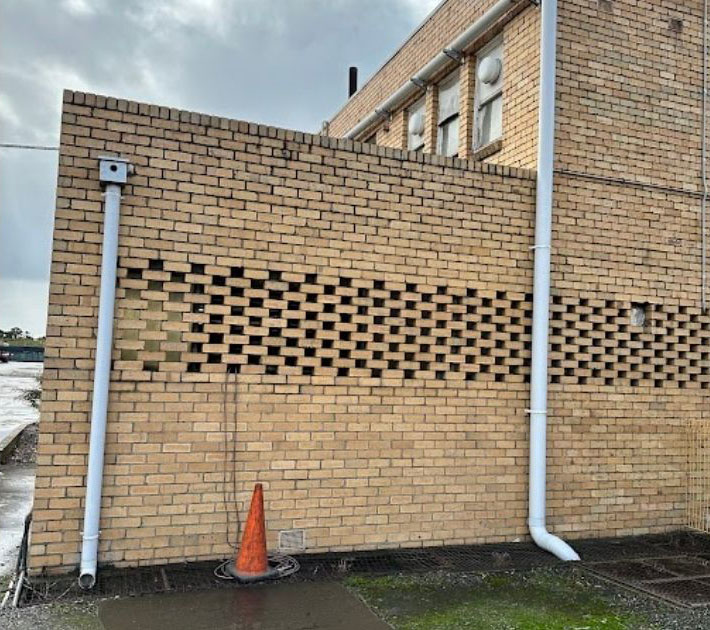 downpipes of a double storey building replaced