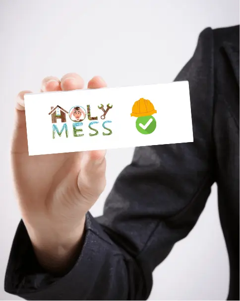 Hand holding card containing holymess repairs logo