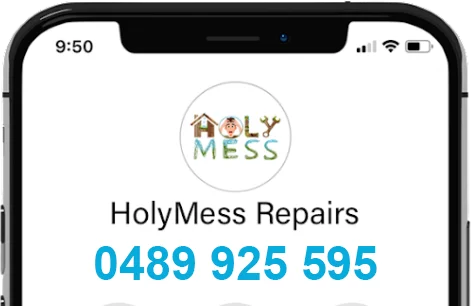 Picture of a mobile phone showing phone number of HolyMess Repairs
