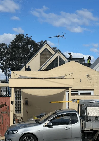 Holymess repairs happy roofers at work