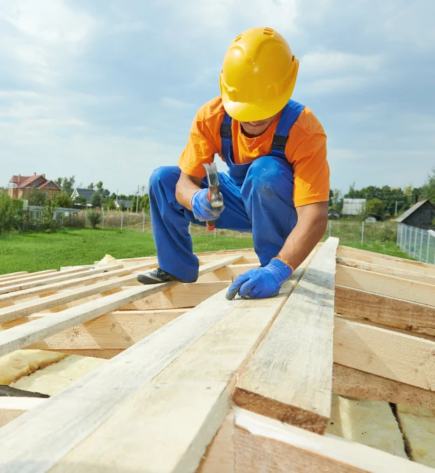 roofer doing repairs on a roof.